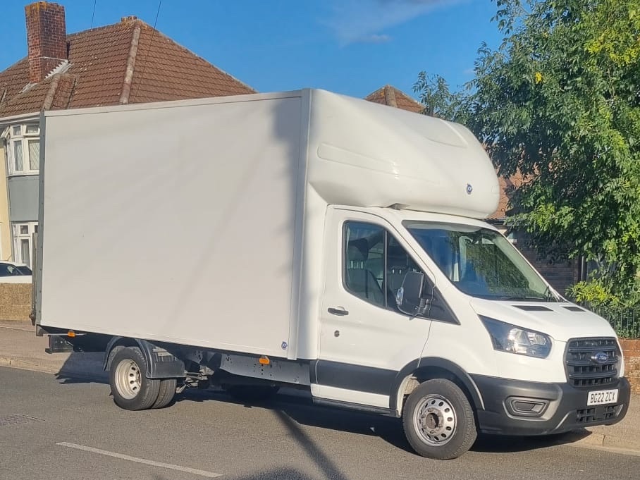 Bartosz's white Luton van parked on a residential street
